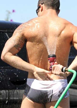 Muscular gay hunks have wild groupsex with well-endowed carwash boys