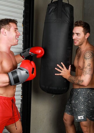 Muscular gay athletes Carter Woods & Kyle Fletcher strip & fuck at the gym