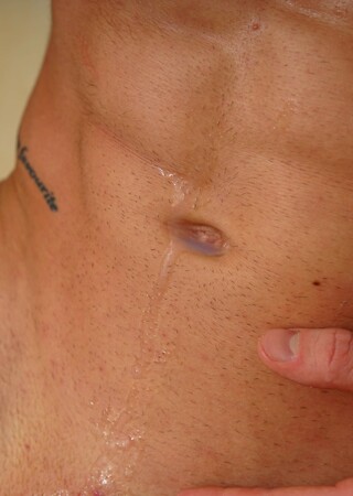 Tattooed uncut athlete Martin Spell jacking off his dick